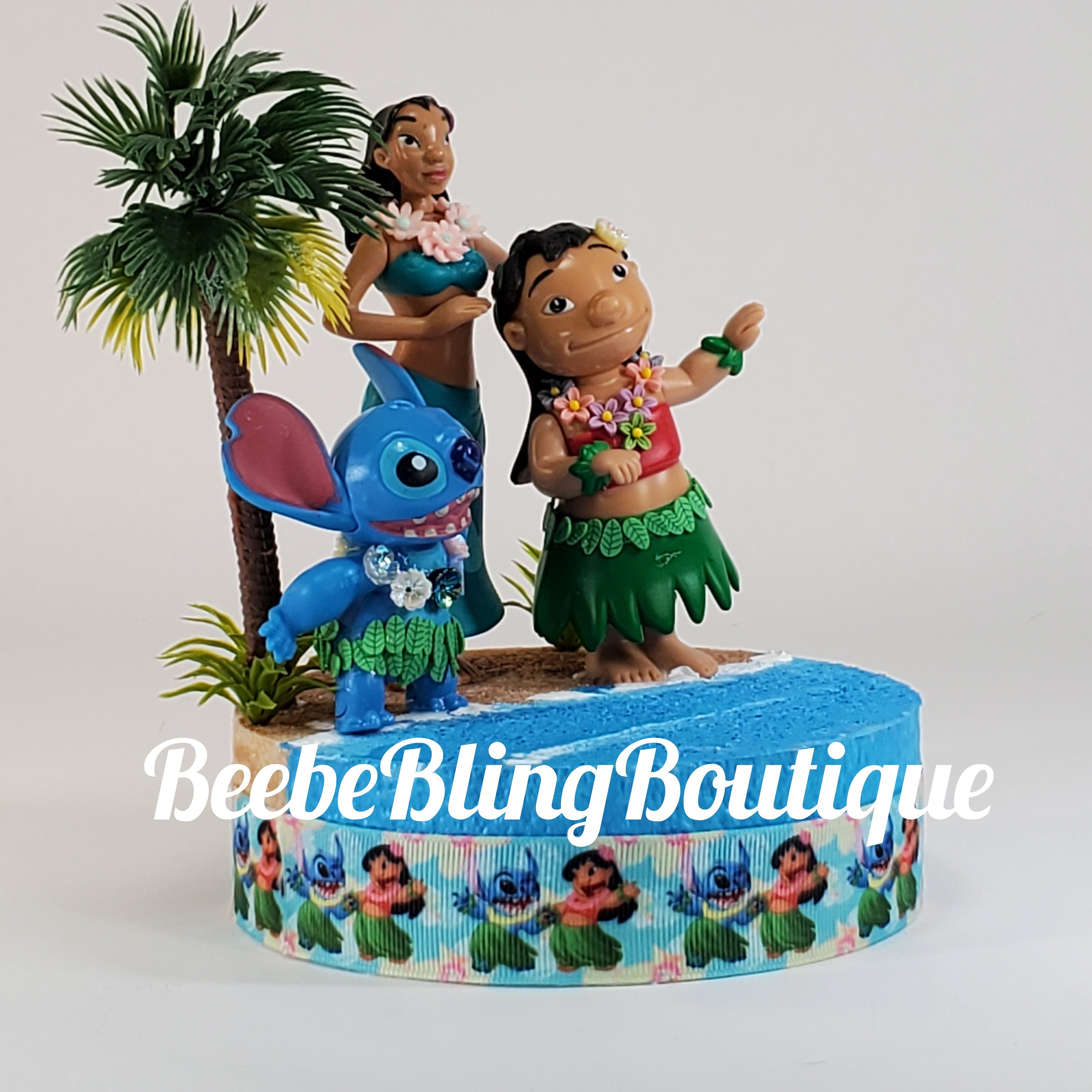 Cute As Cakes - The cutest lilo and stitch cake🌺 Toppers
