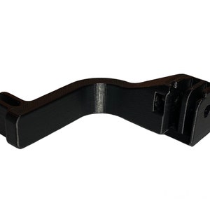 May include: Black plastic GoPro mount with a curved arm and a standard GoPro mount on the end.