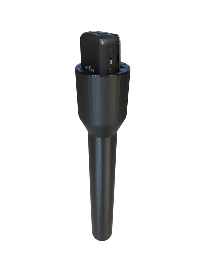 Microphone handle with DJI Mic TX installed.