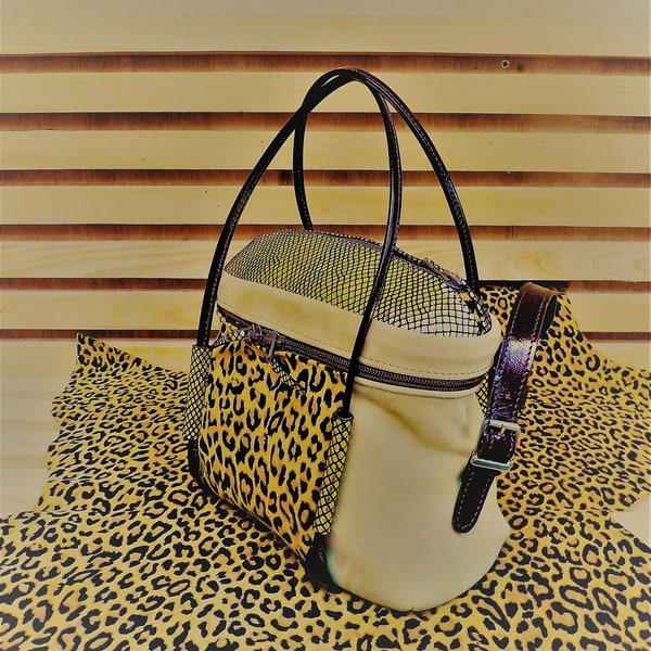 Small multi-pocket bag in genuine sand and leopard leather, carried by hand or across the body