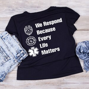 Police, Fire, EMS, 911, emergency services, dispatcher, medical, first responders, sheriff T-shirt No one fights alone in this family