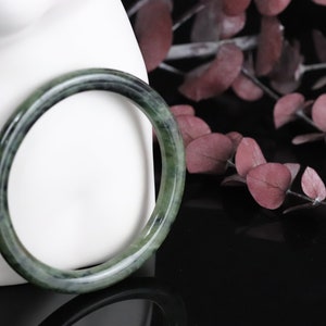 Burmese Jadeite Bangle: Elegant Dark/White Gemstone Jewelry (62.6mm)