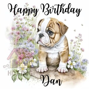 May include: Happy Birthday Dan card featuring a watercolour illustration of a bulldog puppy with pink and blue flowers.