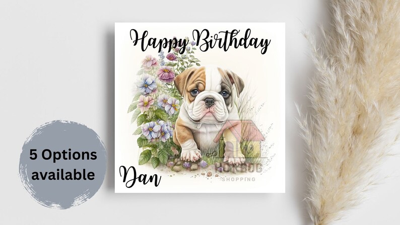 13.5cm square birthday card with a bulldog puppy on the front saying happy birthday - the name can be customised. The inside is left blank. 5 options available.