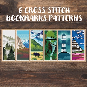 May include: Six cross-stitch bookmark patterns are shown, each depicting a different landscape. The designs include forests, mountains, a lighthouse, and a building with cherry blossoms. The text "6 Cross Stitch Bookmarks Patterns" is at the top.