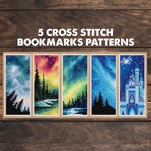 May include: Five rectangular cross stitch bookmark patterns featuring pixelated designs of night skies, forests, and a castle. The text 5 CROSS STITCH BOOKMARKS PATTERNS is displayed above the five distinct vertical designs in a white font.