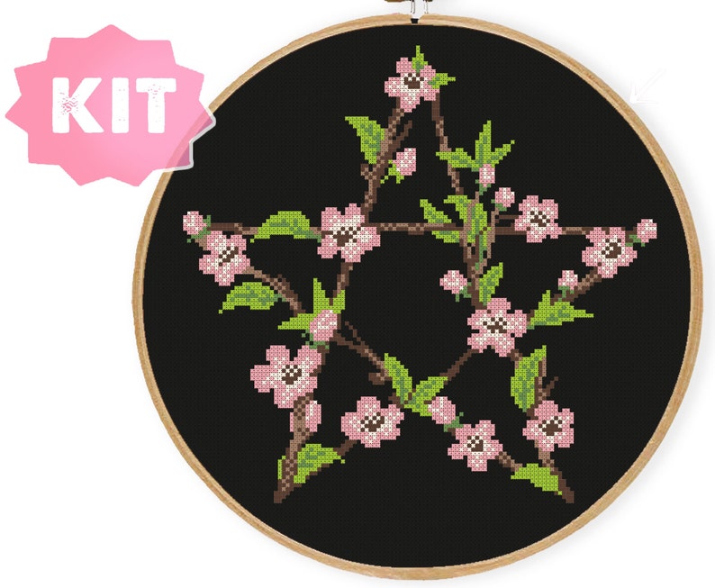 May include: A cross-stitch embroidery kit featuring a pentagram design with pink flowers and green leaves on a black background.