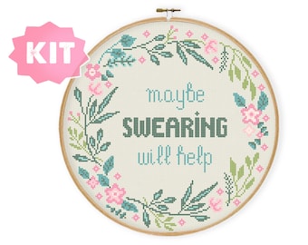 May include: A cross-stitch embroidery kit featuring a floral wreath with the text "maybe swearing will help".