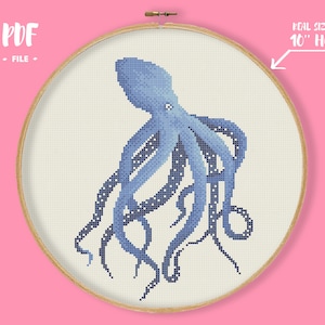 May include: A cross-stitch pattern of a blue octopus, displayed in a 10-inch hoop. The octopus is rendered in shades of blue, with detailed stitching. The text "PDF FILE" is visible. The background is a light cream color.