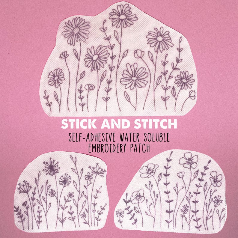 May include: Three white water-soluble embroidery patches with a floral design. The patches are shaped like irregular clouds and feature a variety of flowers and leaves. The text "STICK AND STITCH" and "SELF-ADHESIVE WATER SOLUBLE EMBROIDERY PATCH" is printed on the image.