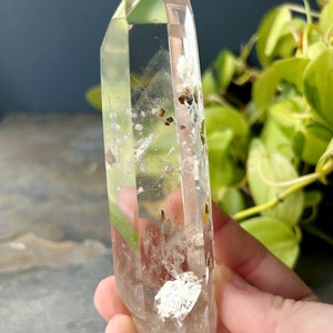 Phantom Quartz Crystal with Enhydro Bubble and Calcite