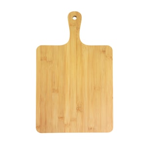 May include: A rectangular bamboo cutting board with a handle. The board is light brown with vertical grain lines. The handle has a hole at the top for hanging. The cutting board is designed for food preparation.