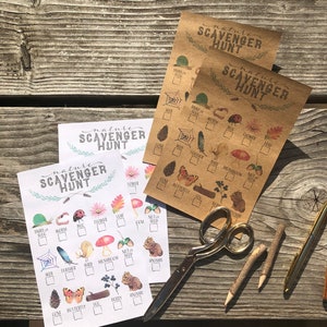 May include: Four printable nature scavenger hunt cards with illustrations of various items to find outdoors, such as a butterfly, a bird, a leaf, a cone, a mushroom, a berry, a nut, a worm, a spider web, a feather, a log, a flower, and an animal. The cards are printed on brown paper and have the text "nature scavenger hunt" at the top.