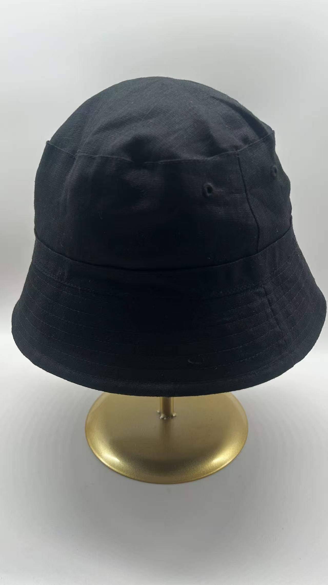 Classic Reversible Black and Blue Linen Bucket Hat Baller Bucket Hats to Complete Every Summer Outfit - InsideHook main image 2