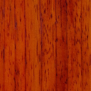 May include: Close-up of a rich, reddish-brown wood grain texture. The wood has a natural, polished finish with a subtle sheen.