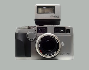 Contax G2 filmcamera + Carl Zeiss 45mm f2 lens + Contax TLA200 flitser / uitstekende staat / complete set