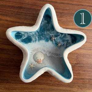 Porta-anéis em formato de estrela-do-mar: Bandeja para joias com tema costeiro, tartarugas e conchas.