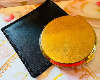 Vintage Statton gold engraved metal design compact