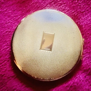 Vintage Kigu of London small etched brass compact