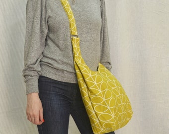 Orla Kiely Mustard Color Hand made adjustable shoulder bag with inner pocket.