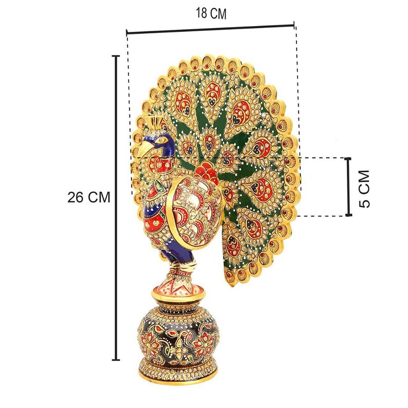 May include: A decorative peacock figurine, 10 inches tall, 7 inches wide, and 2 inches thick. The peacock features a blue head and body, a green and gold tail, and a decorative base. The figurine is adorned with red and white accents.