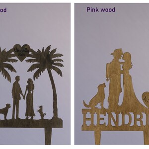 May include: Two wedding cake toppers, one with a couple standing under palm trees and the other with a couple holding each other. Both toppers feature a dog and the text "Connelly 2020" and "Hendrix 4.4.20".