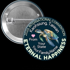 May include: A round button with a pin back, featuring a sea turtle illustration in shades of blue, green, and yellow. The button has text that reads "2026 International Convention, Kaohsiung, Taiwan" and "Eternal Happiness."
