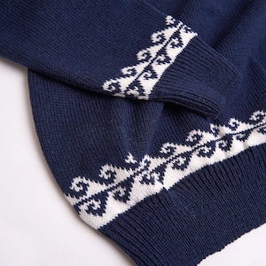 Navy blue oversized Christmas sweater with reindeers winter design for men made of wool with ribbed cuffs and hems