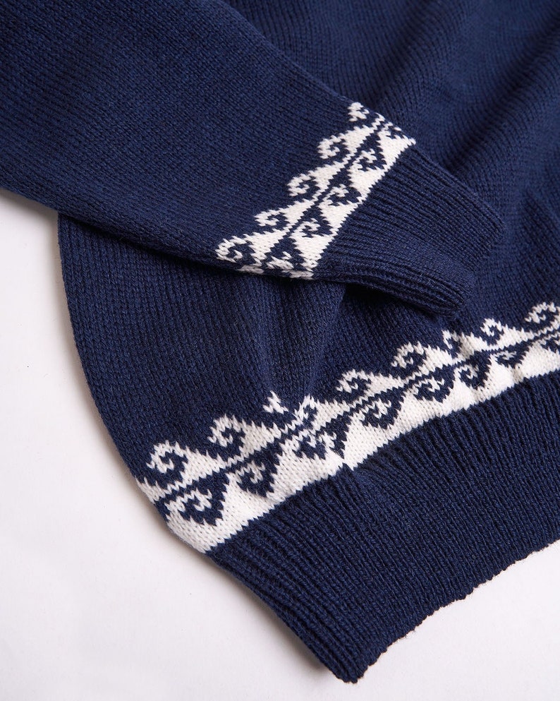 Navy blue oversized Christmas sweater with reindeers winter design for men made of wool with ribbed cuffs and hems