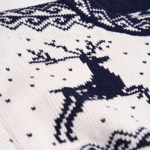 Navy blue oversized Christmas sweater with reindeers winter design for men made of wool