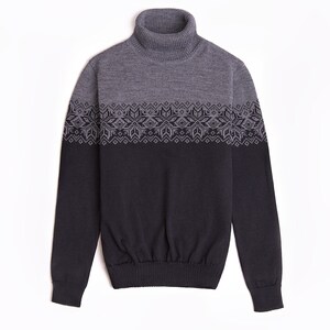 May include: A gray and black turtleneck sweater with a geometric pattern around the chest.