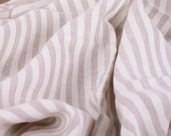 100% linnen stof 200gsm gestreepte naturel. Middelzwaar, dichte. Voor jurken, blouses, broeken, rokken. Verkocht per meter op maat gesneden
