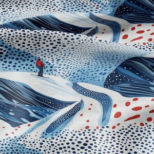 May include: A skier in red clothing is skiing down a white and blue patterned slope. The pattern features blue and white dots and wavy lines.