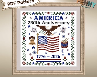 May include: A framed cross-stitch pattern celebrating America's 250th Anniversary. The design features the American flag, an eagle, a drum, a bell, and the years 1776-2026. The words "AMERICA 250th Anniversary" are displayed at the top.