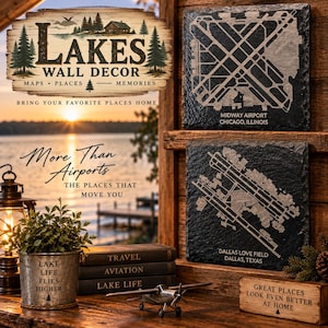 May include: Two square black slate tiles featuring engraved white airport runway maps for Midway Airport in Chicago and Dallas Love Field in Texas. The tiles are displayed on a wooden shelf alongside a metal airplane model and a metal planter.