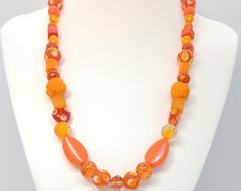 Oranje gemengde kralenketting