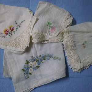 vintage handmade hankys 4 with,embroidered flowers on one corner