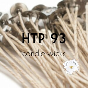 May include: A close-up of a bundle of beige candle wicks with silver tops. The text "HTP 93 candle wicks" is visible in the center of the image. A small logo with the text "Hive and Honey Candle Co." is visible in the lower right corner.