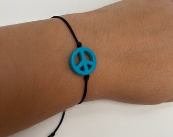 Adjustable Turquoise Howlite Peace Sign Bracelet: Silky Cord