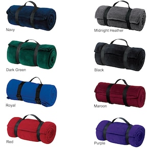 various colors of blankets with black, red, blue, green, purple, and