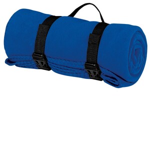 a blue yoga mat with straps on it