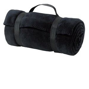 a rolled up black towel on a white background