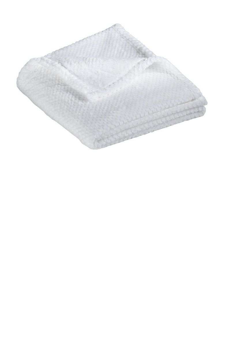 a white towel folded on top of each other