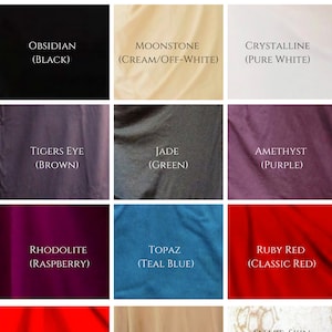 May include: A color chart showing 10 different colors of bamboo fabric. The colors are: Obsidian (Black), Moonstone (Cream/Off-White), Crystalline (Pure White), Tigers Eye (Brown), Jade (Green), Amethyst (Purple), Rhodolite (Raspberry), Topaz (Teal Blue), Ruby Red (Classic Red), Spanish Red (Bright Red), Nude (Beige), and Snake-Skin Indonesian Batik (Screen Printed).