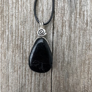 Tourmaline for Protection from EMFs and Negative Energies. Swirl Signifies Consciousness