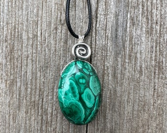 Malachite for Grounding and Spiritual Growth. Swirl to Signify Consciousness.