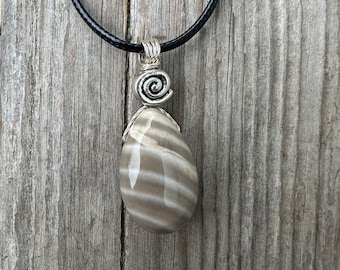 Flint for Grounding and Past Life Work. Swirl to Signify Consciousness