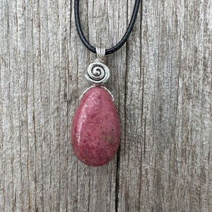 Rhodonite for Compassion, Balancing Emotions, and Self Confidence. 18 inch Black Cable