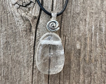 Clear Quartz for Protection, Clearing Blockages and Amplifying Energy. Swirl to Signify Consciousness