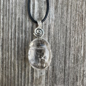 Rock Crystal Necklace for Wisdom, Loyalty and Protection. Swirl Signifies Consciousness